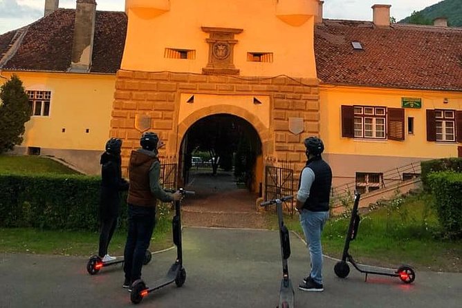 Brasov Old Town Guided Tour With Electric Scooters - The fortifications below Tâmpa