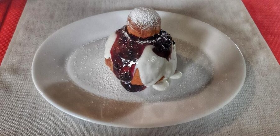 Bucharest: Carpathian Snowmobile / ATV Adventure Tour - Sinaia lunch and Romanian sweets