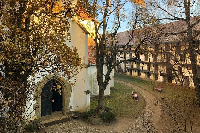 Experience the History of Bran Castle and Saxon Fortifications in Burzenland - Harman’s basilica, moat, and early paintings