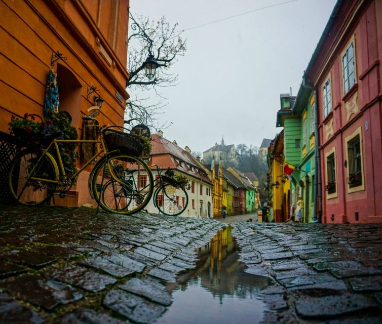 From Brasov – Red Line & City Tour Sighisoara UNESCO - Entering the Citadel Market Place