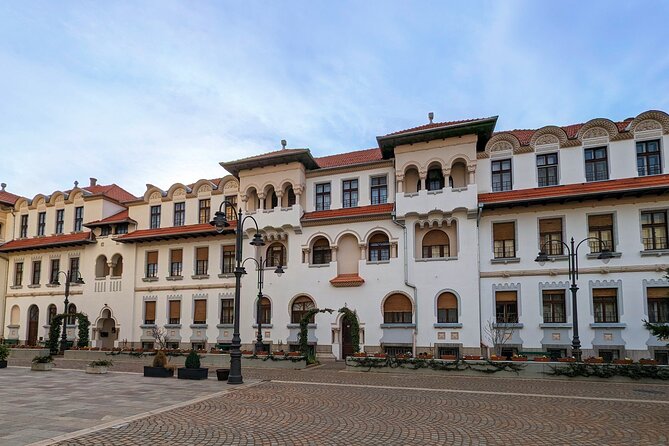Half-Day Private Food and Wine Walking Tour Oradea Romania - Black Hawk Palace Arcade and the city’s famous meeting place