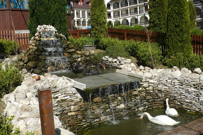 Peles Castle and optional Cantacuzino Castle from Brasov - Caraiman Monastery and its mountain setting