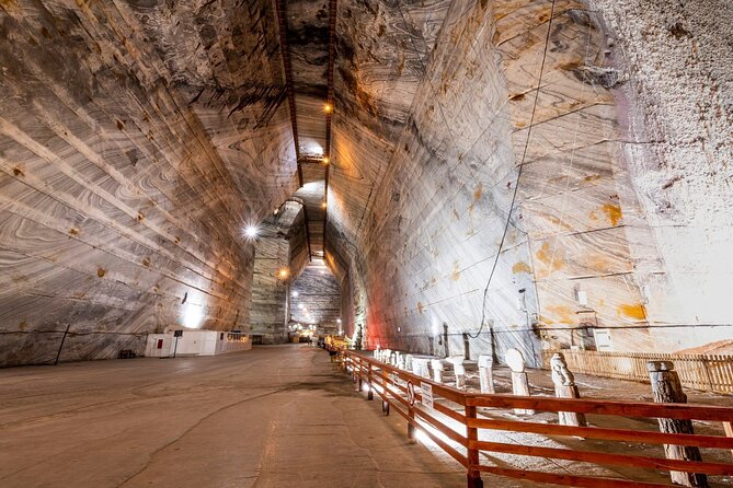 Salt Mine Tour from Bucharest with Entrance Ticket - Descending into the Unirea Mine
