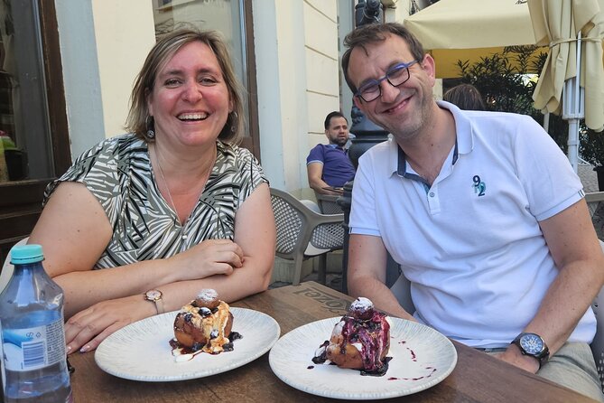 Sweet Delights History and Desserts Walking Tour in Bucharest - Starting with an eclair at the Romanian Athenaeum